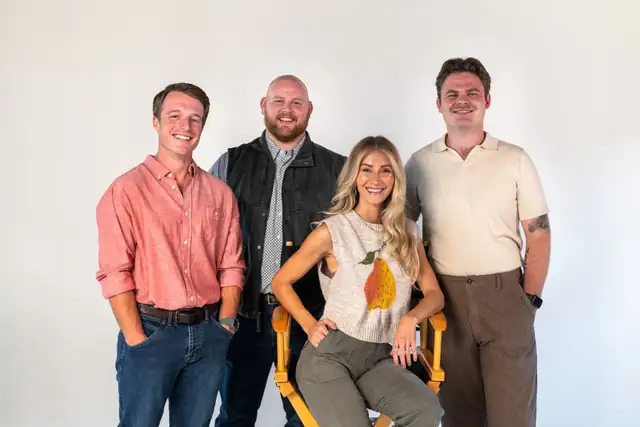 The four-person OKC Kitchen & Bath leadership team in a group portrait